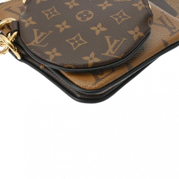 800000129373000 4 Louis Vuitton Pochette Trio Monogram Brown