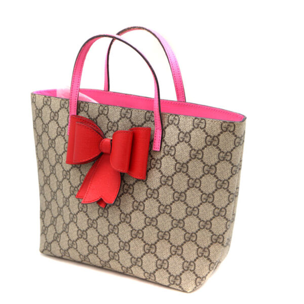 a22 8627 1 Gucci GG Supreme Bow Tote Bag Brown Beige Pink