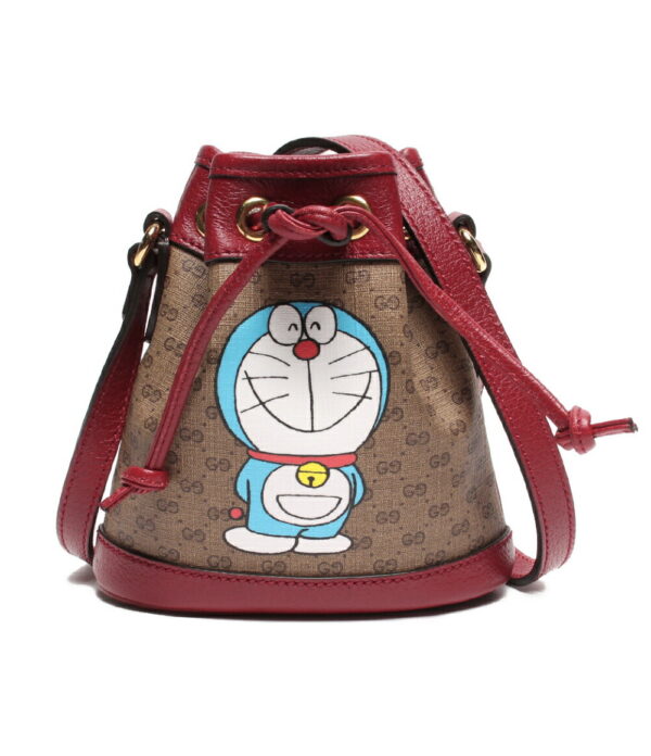 abo0042627 1 Gucci Doraemon GG Supreme Mini Bucket Bag