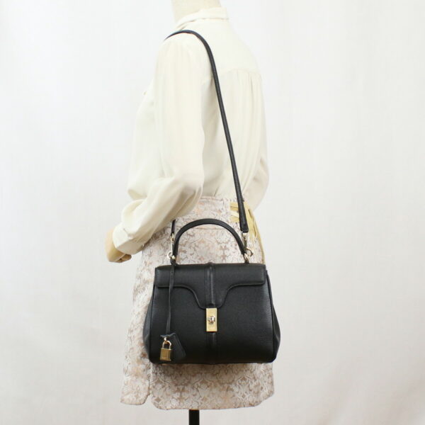 cel18800011 b Celine Small 16 Saise Handbag Black