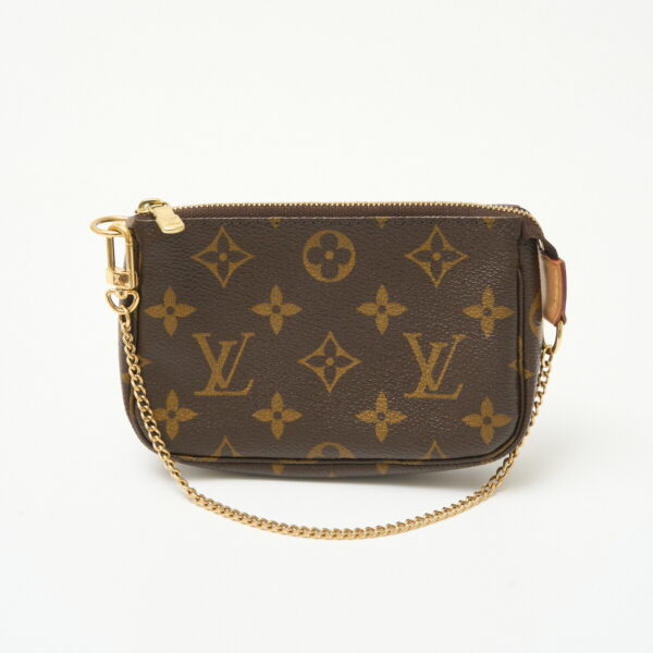 compass1711338881 Louis Vuitton Mini Pochette Accessoire Pouch Monogram Leather Brown