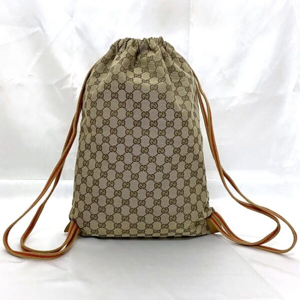 ec17618 2 Gucci Drawstring Backpack GG Supreme Canvas Leather Beige Brown