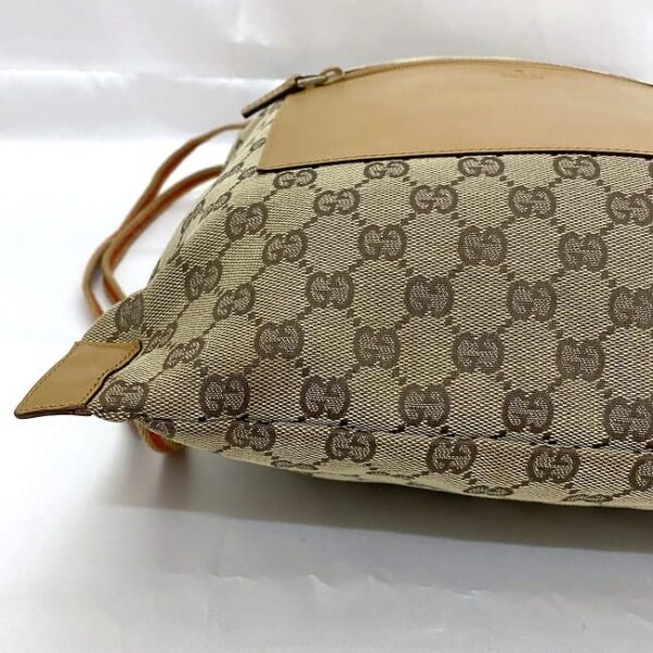 ec17618 5 Gucci Drawstring Backpack GG Supreme Canvas Leather Beige Brown