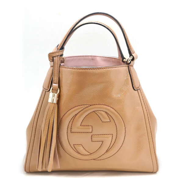 imgrc0082769874 Gucci Handbag GG Enamel Leather Beige