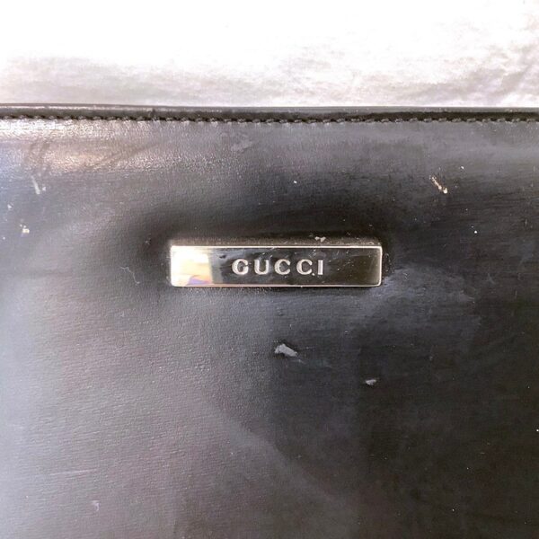 imgrc0083717162 Gucci Leather Handbag Logo Plate