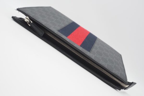 imgrc0086956305 Gucci Waping Line GG Supreme Clutch Bag Gray Navy Red