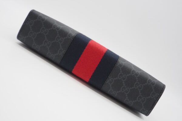 imgrc0086956306 Gucci Waping Line GG Supreme Clutch Bag Gray Navy Red