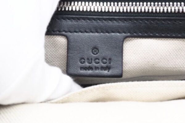 imgrc0096291306 Gucci GG Embossed Messenger Bag Leather Black