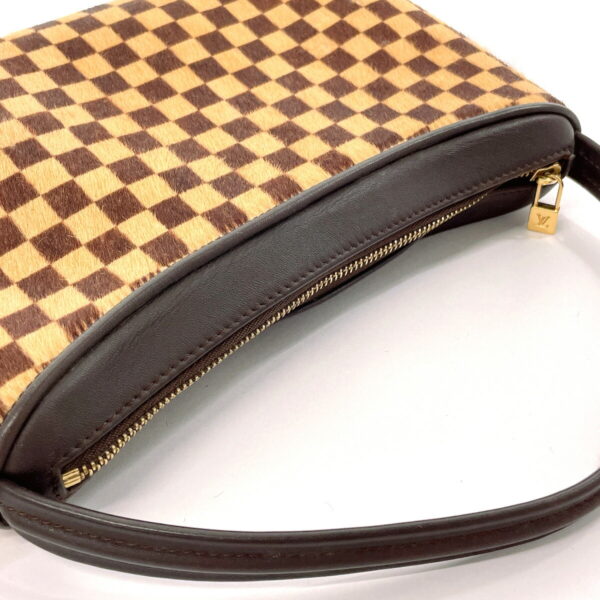 n3081855 12 Louis Vuitton Tiger Teagle Handbag Damier Sauvage Brown