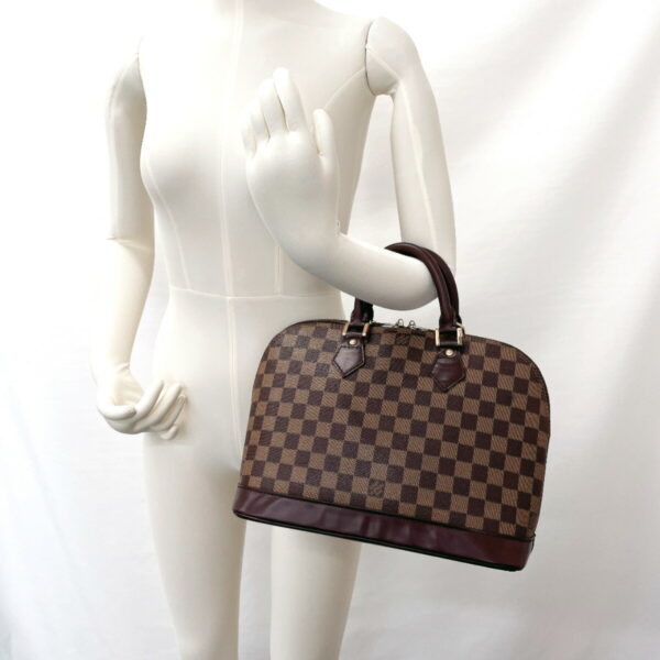 n3092164 13 Louis Vuitton Alma PM Handbag Damier Brown