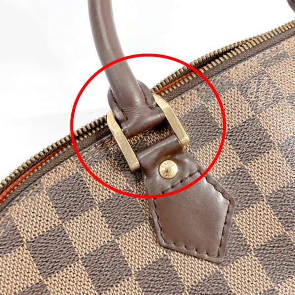 n3092164 21 Louis Vuitton Alma PM Handbag Damier Brown