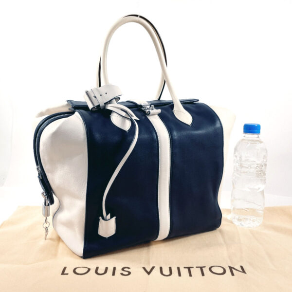 s4044304 21 Louis Vuitton Speedy North South Handbag Leather White