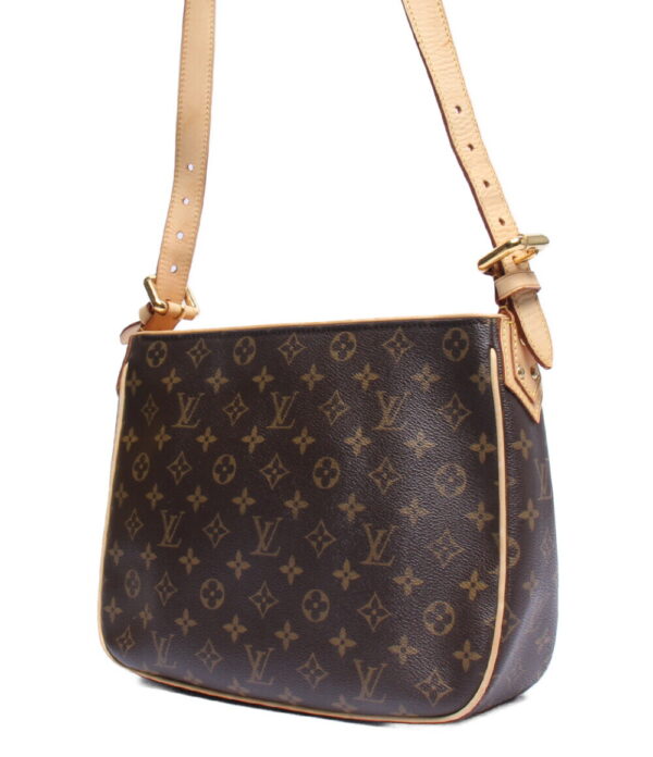 a176735001 2 Louis Vuitton Hudson GM Monogram Crossbody Bag